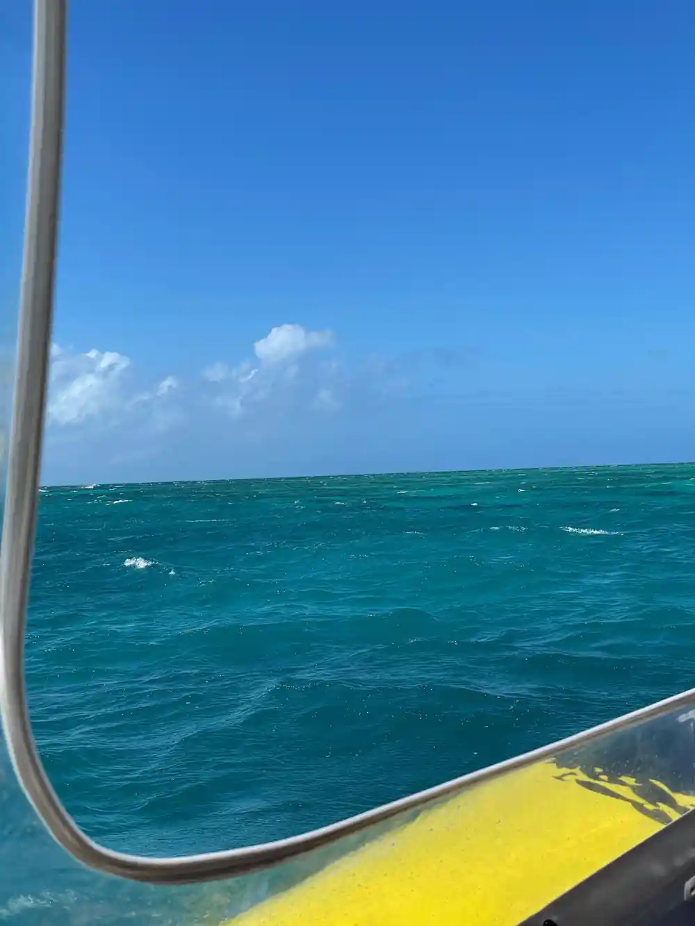 The reef edge and open sea from the boat's rail